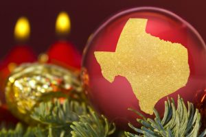 Red bauble with the golden shape of Texas.(series)